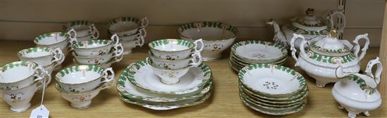 A 19th century Staffordshire gilt and green decorated teaset